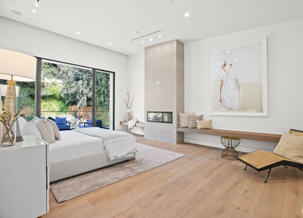 The Home in Bel Air is a stunning modern organic is nestled in a peaceful setting and surrounded by lush landscaping now available for sale. This home located at 2814 Roscomare Rd, Los Angeles, California