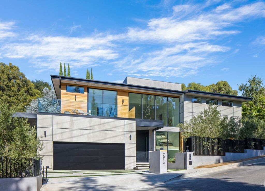 The Home in Bel Air is a stunning modern organic is nestled in a peaceful setting and surrounded by lush landscaping now available for sale. This home located at 2814 Roscomare Rd, Los Angeles, California