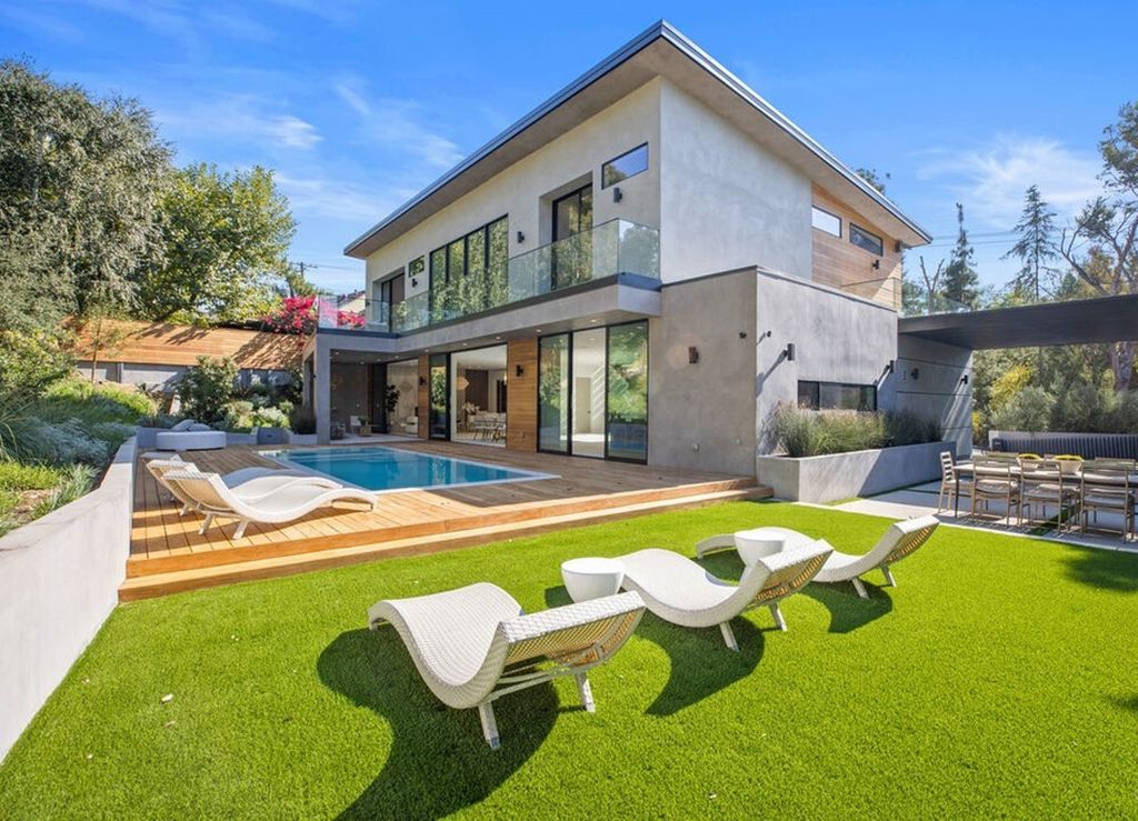 The Home in Bel Air is a stunning modern organic is nestled in a peaceful setting and surrounded by lush landscaping now available for sale. This home located at 2814 Roscomare Rd, Los Angeles, California