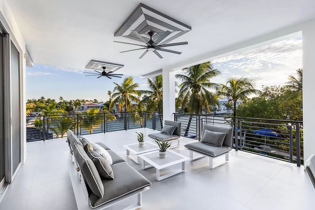 The Home in Florida is a stunning waterfront masterpiece in Lower Matecumbe Key with breathtaking views of the sunset now available for sale. This home located at 146 Bayview Dr, Lower Matecumbe Key, Florida