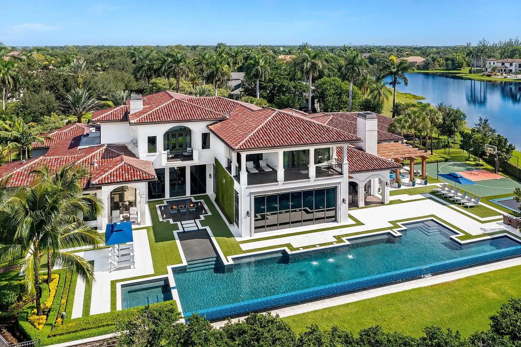 The Mansion in Weston is a seven-bedroom sanctuary by renowned architect Randall Stofft set on a prestigious gated community now available for sale. This home located at 3030 Meadow Ln, Weston, Florida