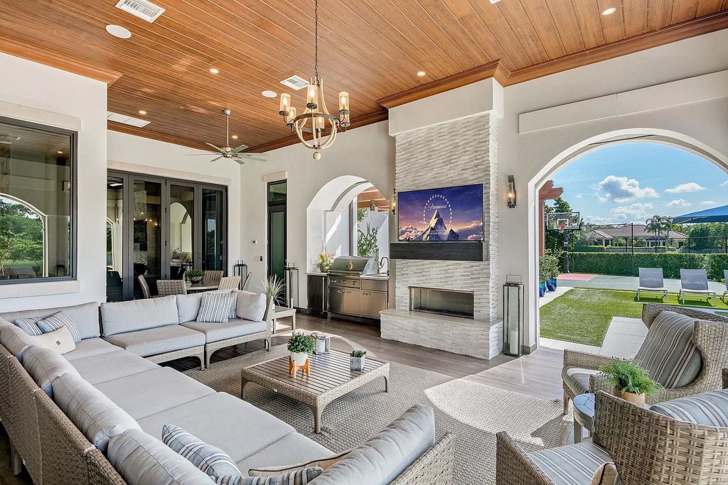 The Mansion in Weston is a seven-bedroom sanctuary by renowned architect Randall Stofft set on a prestigious gated community now available for sale. This home located at 3030 Meadow Ln, Weston, Florida