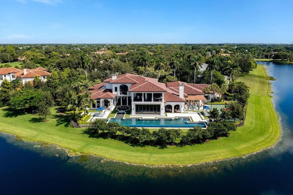 The Mansion in Weston is a seven-bedroom sanctuary by renowned architect Randall Stofft set on a prestigious gated community now available for sale. This home located at 3030 Meadow Ln, Weston, Florida