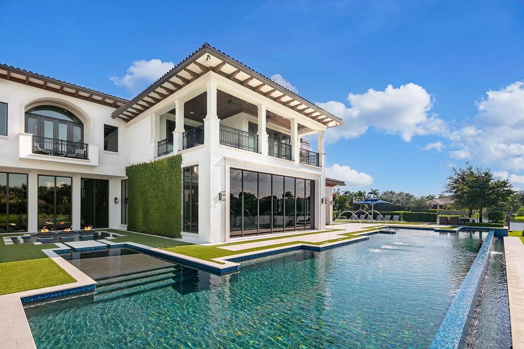 The Mansion in Weston is a seven-bedroom sanctuary by renowned architect Randall Stofft set on a prestigious gated community now available for sale. This home located at 3030 Meadow Ln, Weston, Florida