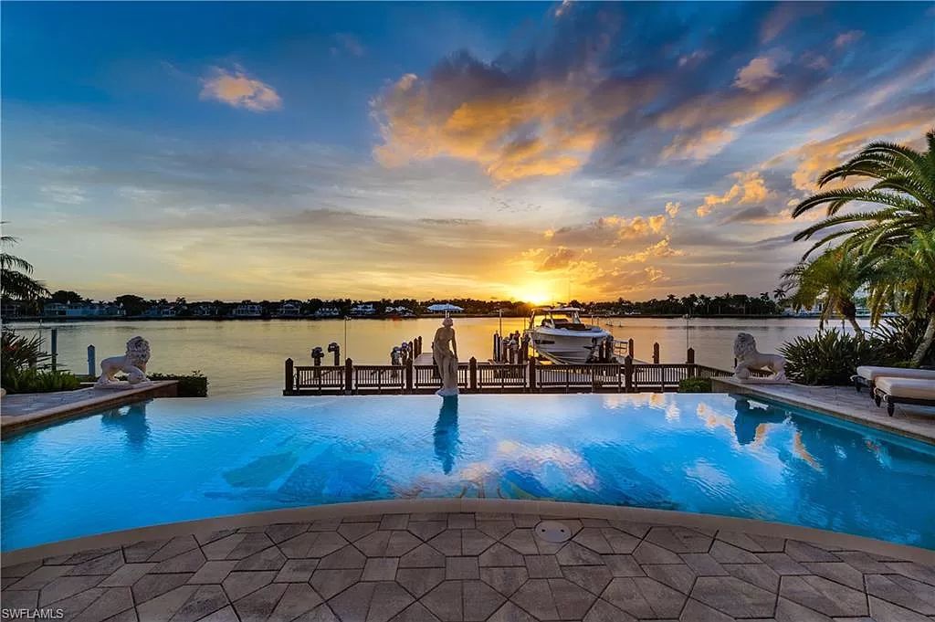 The Naples Home with panoramic views of Naples Bay and a direct western exposure allowing stunning evening sunsets now available for sale. This home located at 2300 Kingfish Rd, Naples, Florida