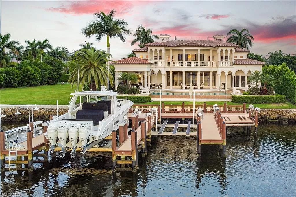 The Naples Home with panoramic views of Naples Bay and a direct western exposure allowing stunning evening sunsets now available for sale. This home located at 2300 Kingfish Rd, Naples, Florida