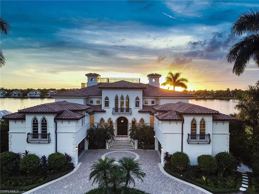 The Naples Home with panoramic views of Naples Bay and a direct western exposure allowing stunning evening sunsets now available for sale. This home located at 2300 Kingfish Rd, Naples, Florida