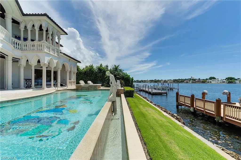 The Naples Home with panoramic views of Naples Bay and a direct western exposure allowing stunning evening sunsets now available for sale. This home located at 2300 Kingfish Rd, Naples, Florida