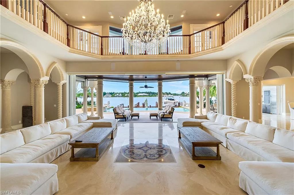 The Naples Home with panoramic views of Naples Bay and a direct western exposure allowing stunning evening sunsets now available for sale. This home located at 2300 Kingfish Rd, Naples, Florida