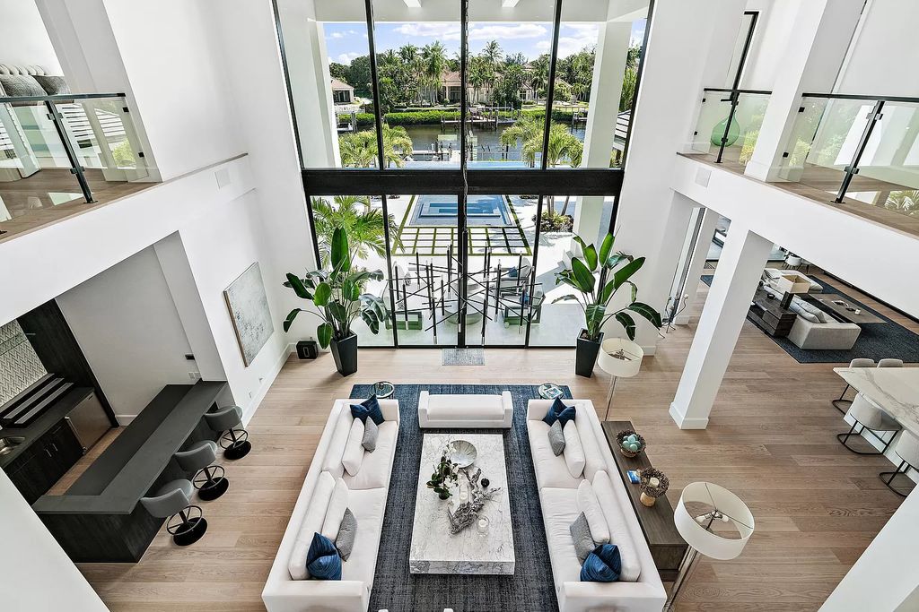 The Jupiter Mansion is a completely renovated home located in the prestigious Admirals Cove has a resort styled backyard now available for sale. This home located at 389 Eagle Dr, Jupiter, Florida