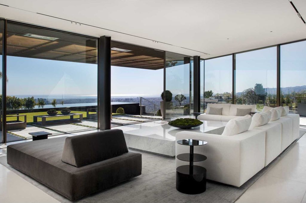 The Bird Streets Mansion is a spectacular new contemporary estate was envisioned by architect Zoltan Pali and home builder Dugally Oberfeld now available for sale. This home located at 9344 Nightingale Dr, Los Angeles, California