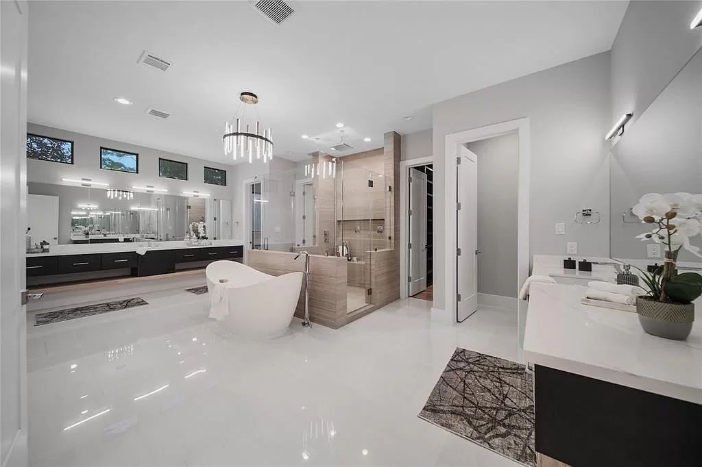 The Houston Home is a stunning new-construction residence offers chic contemporary design and gorgeous outdoor space now available for sale. This home located at 614 Pinehaven Dr, Houston, Texas