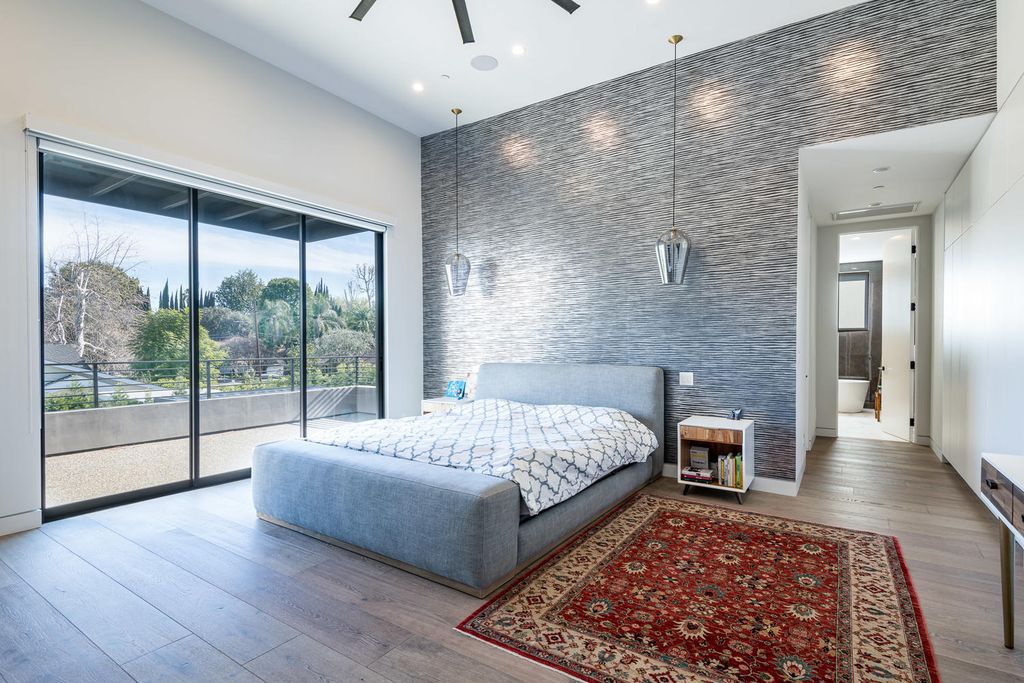 The Home in Encino features a stately entrance, with high ceilings, a favorable open floor plan and natural light illuminating the space now available for sale. This home located at 5100 Sophia Ave, Encino, California