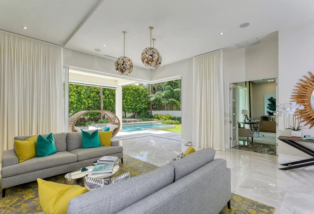 The Delray Beach Home is a beautifully designed two story contemporary estate with tropically landscaped back yard now available for sale. This home located at 609 Seagate Dr, Delray Beach, Florida