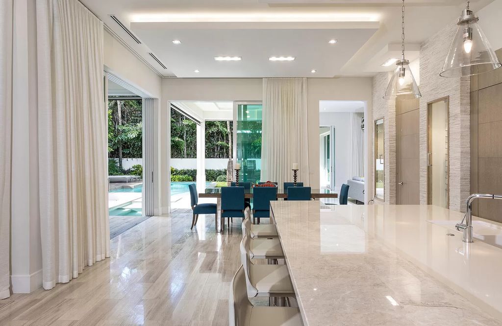 The Delray Beach Home is a beautifully designed two story contemporary estate with tropically landscaped back yard now available for sale. This home located at 609 Seagate Dr, Delray Beach, Florida
