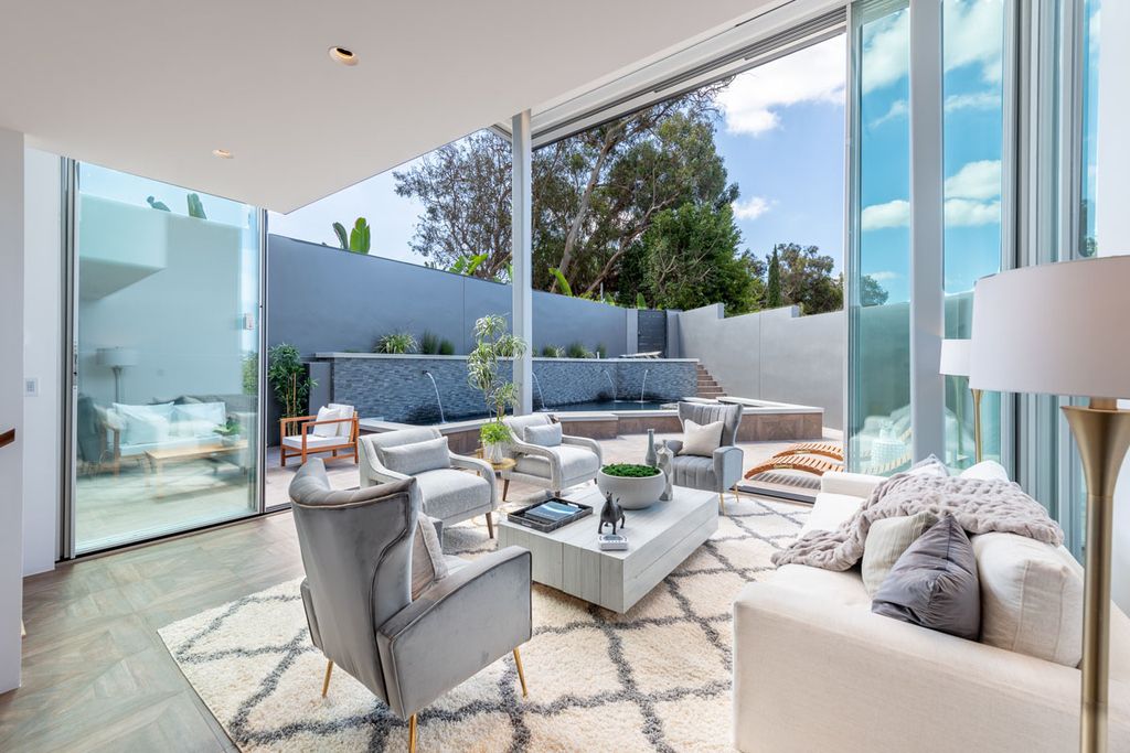 The Home in Beverly Hills is a property extremely light and bright using the best materials reimagined by Harrison Design now available for sale. This home located at 9400 Readcrest Dr, Beverly Hills, California