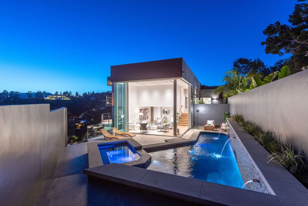 The Home in Beverly Hills is a property extremely light and bright using the best materials reimagined by Harrison Design now available for sale. This home located at 9400 Readcrest Dr, Beverly Hills, California