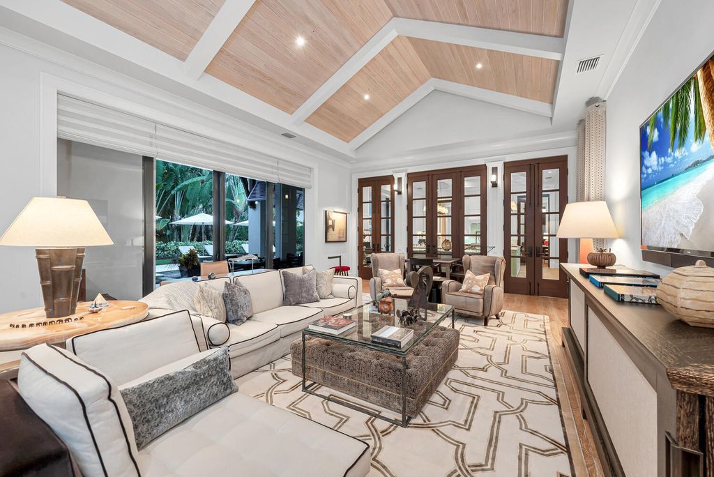 The Home in Naples is an exquisite estate now with glass walls open to outdoor veranda & pool blending indoor and outdoor available for sale. This home located at 2284 Crayton Rd, Naples, Florida