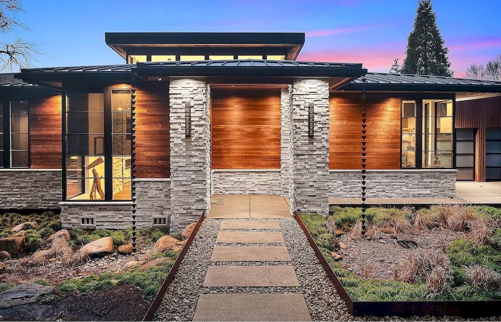 The Warm Elegance Modern House in Oregon abounds natural light now available for sale. This home is located at 5185 Carman Dr, Lake Oswego, Oregon