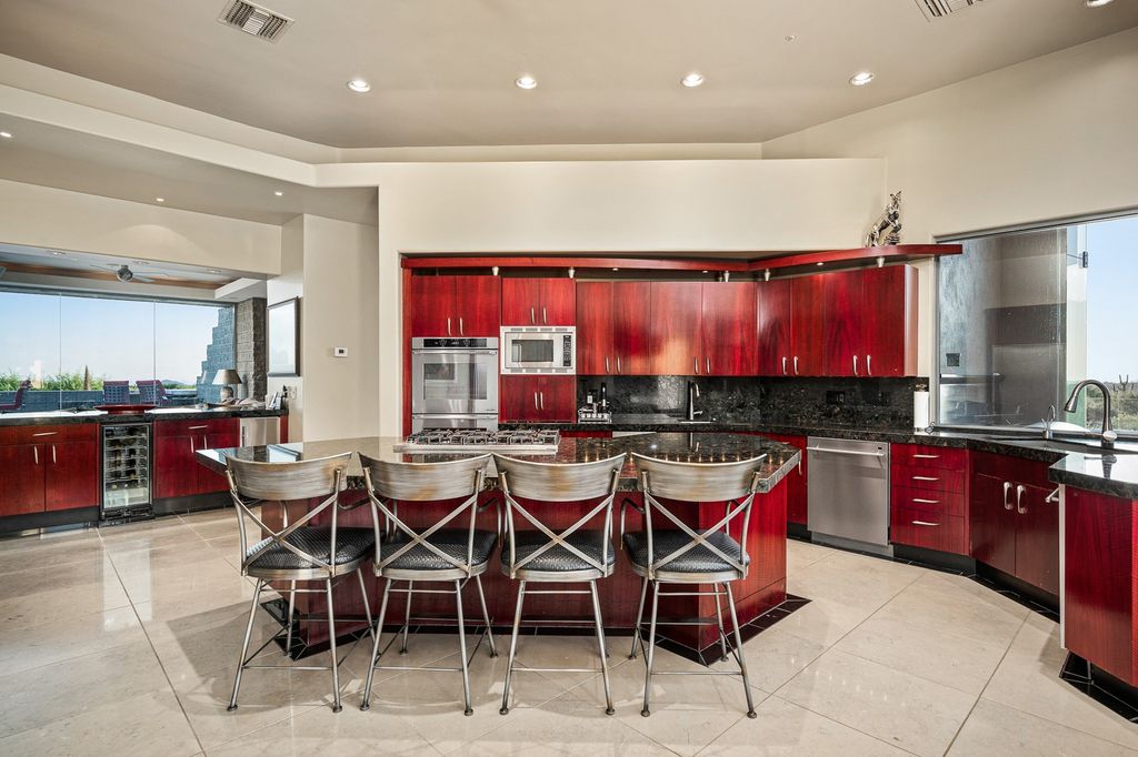 Wine red kitchen cabinets evoke a classic and timeless feel, adding a sense of warmth and sophistication to the space. The rich and deep hue exudes a luxurious and elegant ambiance, creating a charming focal point in any classic-style kitchen. Such a luxury idea to transfer your kitchen style!