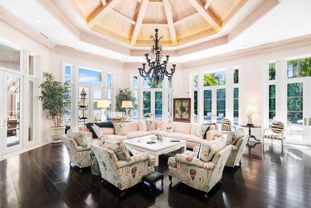 The Jupiter Mansion is a palatial estate nestled quietly among the supreme privacy of Jupiter’s coveted Admiral’s Cove now available for sale. This home located at 372 Regatta Dr, Jupiter, Florida