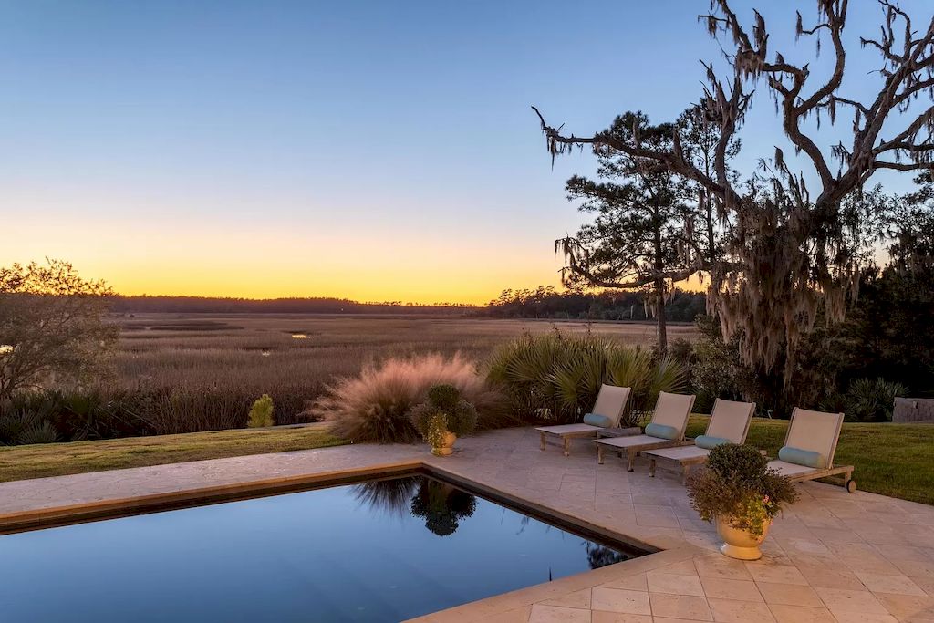 The Beautiful Custom Home is a luxurious home now available for sale. This home located at 1185 Hughes Rd, Charleston, South Carolina; offering 06 bedrooms and 06 bathrooms with 7,300 square feet of living spaces.