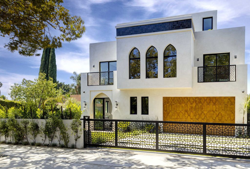 The Home in Los Angeles is a brand new contemporary Moroccan estate positioned on an oversized corner lot in trendy Beverly Grove now available for sale. This home located at 8255 Oakwood Ave, Los Angeles, California
