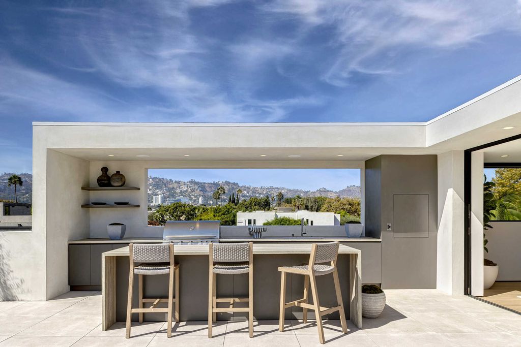 The Home in Los Angeles is a brand new contemporary Moroccan estate positioned on an oversized corner lot in trendy Beverly Grove now available for sale. This home located at 8255 Oakwood Ave, Los Angeles, California