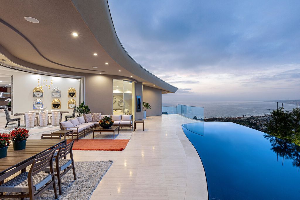 The Home in La Jolla is a brand new construction has dazzling design features, with panoramic North Shore ocean and coastal views now available for sale. This home located at 7447 Hillside Dr, La Jolla, California