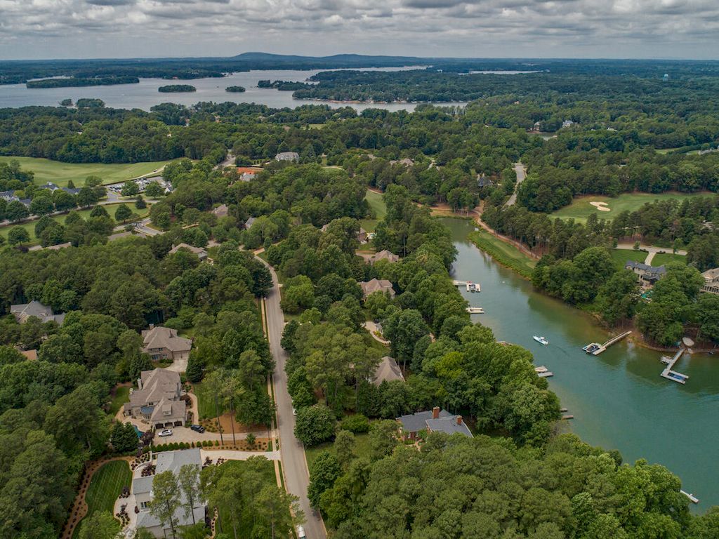 The Classic Georgian Revival Brick Estate is a luxurious home now available for sale. This home located at 151 Easton Dr, Mooresville, North Carolina; offering 05 bedrooms and 08 bathrooms with 10,677 square feet of living spaces.