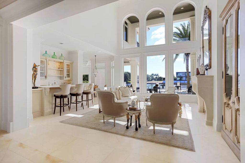 The Home in Boca Raton is a Exquisitely updated residence with stunning east and southeast waterway views and tropical paradise backyard area now available for sale. This home located at 620 Golden Harbour Dr, Boca Raton, Florida