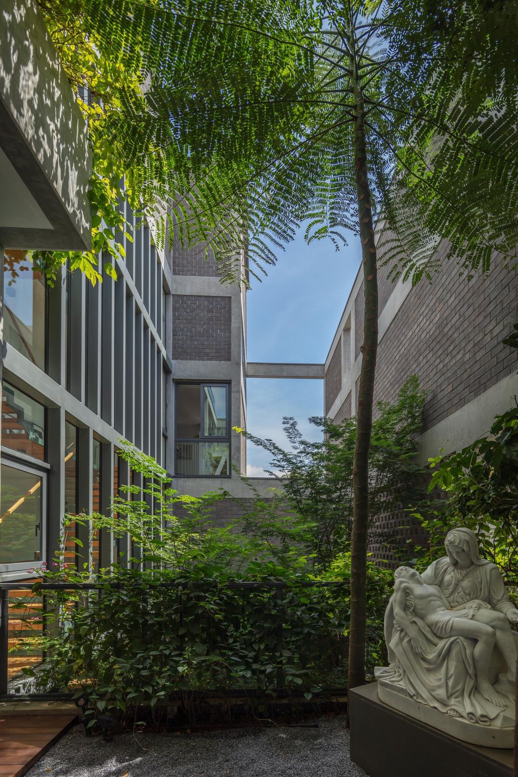 Green Revelation House Enveloped by Lush Gardens by HYLA Architects
