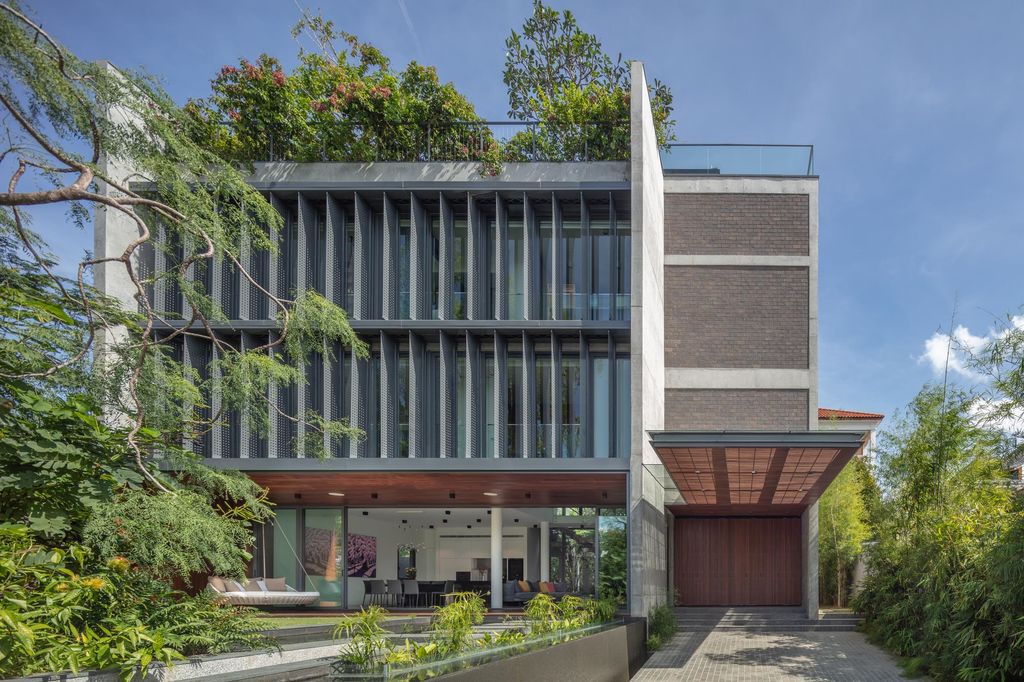 Green Revelation House Enveloped by Lush Gardens by HYLA Architects