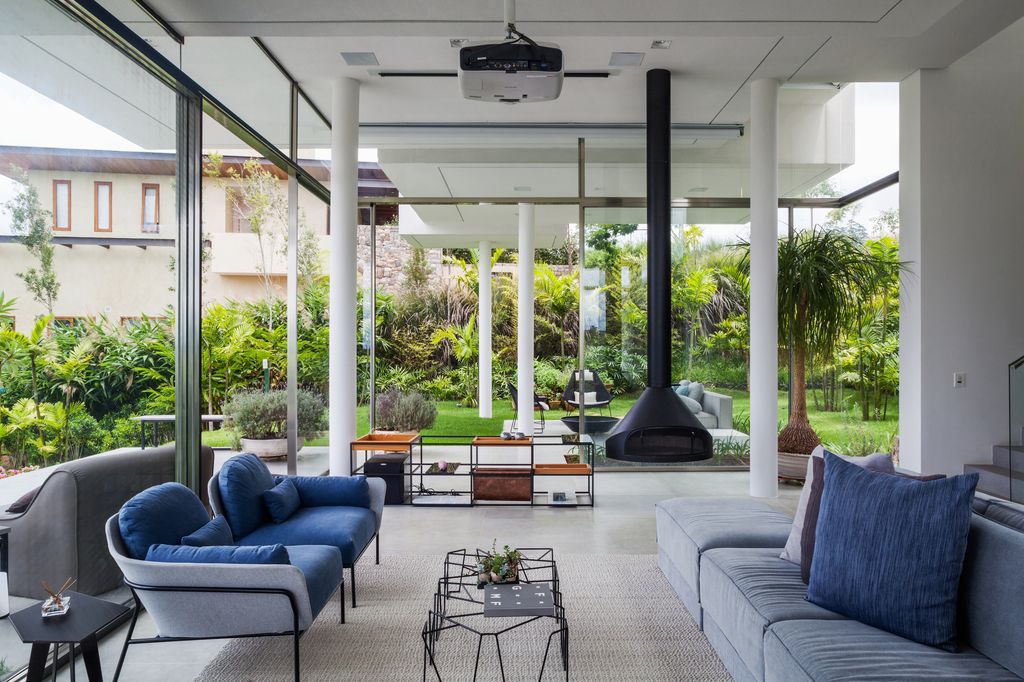 Neblina house, stunning white volumes on sloping plot by FGMF Arquitetos