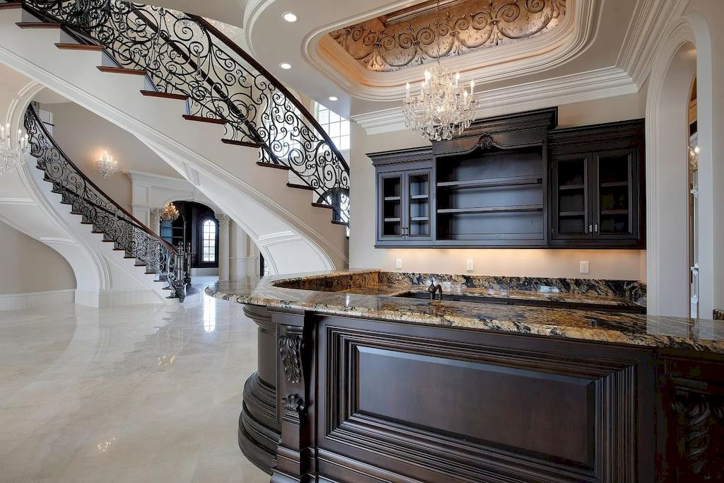 The Tennessee Home is a luxurious home with 30 ft ceilings, dual hand crafted iron staircases & over 100 chandeliers now available for sale. This home located at 2423 Hidden River Ln, Franklin, Tennessee; offering 06 bedrooms and 13 bathrooms with 22,743 square feet of living spaces.