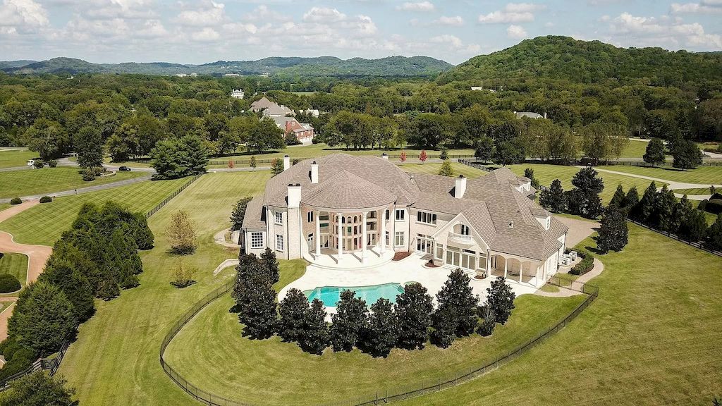 The Tennessee Home is a luxurious home with 30 ft ceilings, dual hand crafted iron staircases & over 100 chandeliers now available for sale. This home located at 2423 Hidden River Ln, Franklin, Tennessee; offering 06 bedrooms and 13 bathrooms with 22,743 square feet of living spaces.