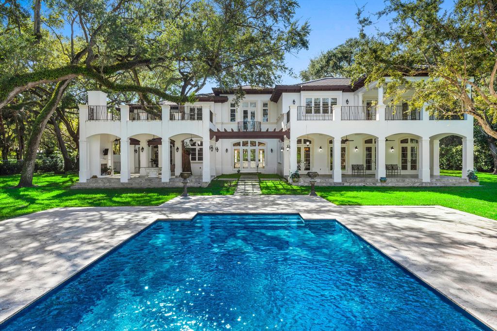 The Villa in Miami is a Palatial Neoclassical Estate on 1.2 park-like acres in guard-gated Snapper Creek Lakes now available for sale. This home located at 5225 Fairchild Way, Miami, Florida