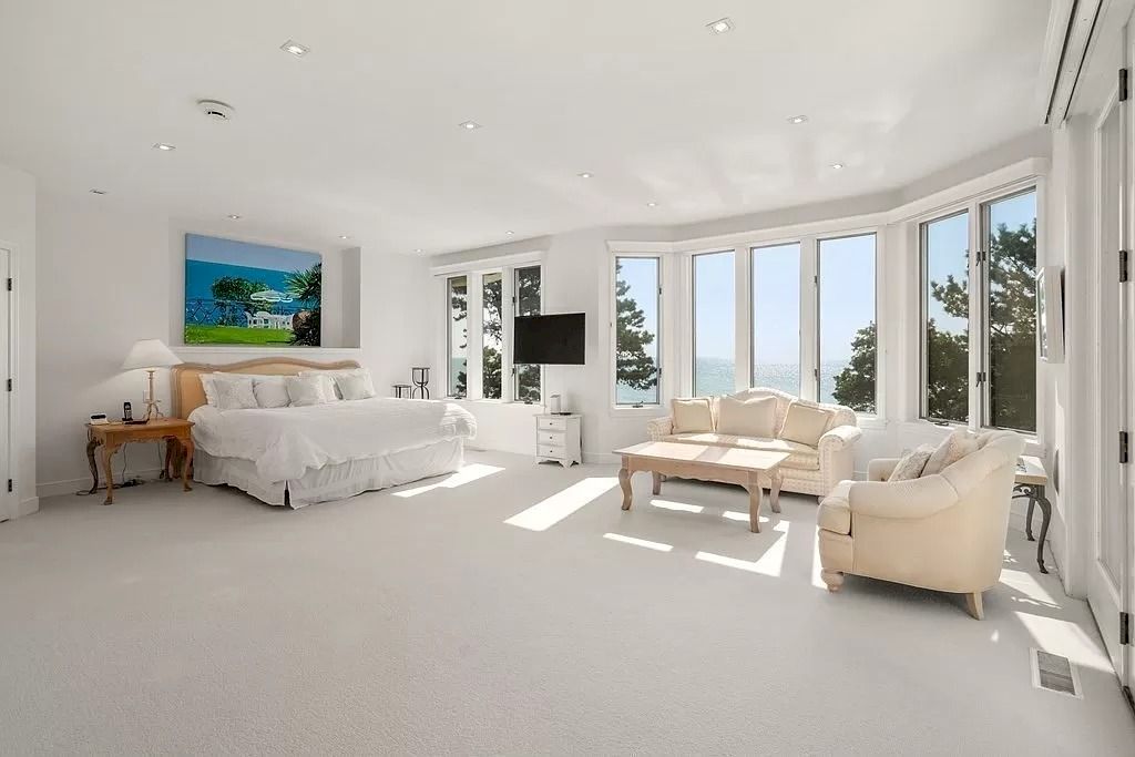 The Perfect Beachfront Home is a luxurious home now available for sale. This home located at 27 Ocean Bluff Dr, Mashpee, Massachusetts; offering 06 bedrooms and 08 bathrooms with 4,220 square feet of living spaces.