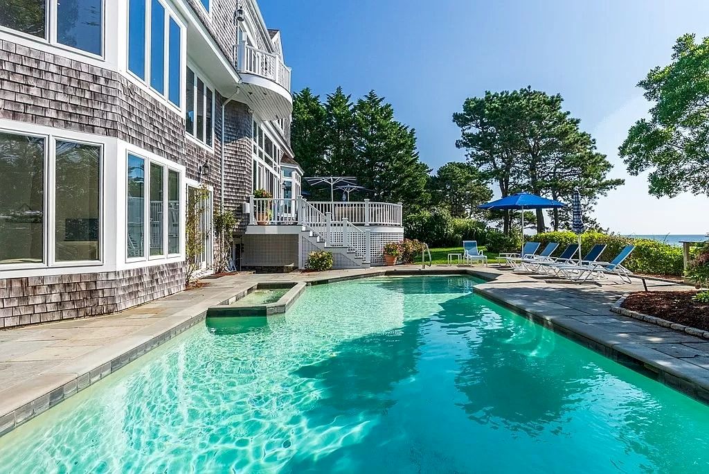 The Perfect Beachfront Home is a luxurious home now available for sale. This home located at 27 Ocean Bluff Dr, Mashpee, Massachusetts; offering 06 bedrooms and 08 bathrooms with 4,220 square feet of living spaces.