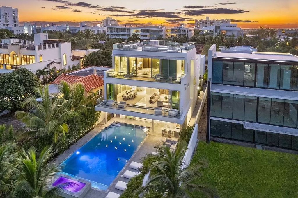 The Miami Beach Home is a stunning new modern construction estate in the esteemed gated Oceanfront community, Altos Del Mar. now available for sale. This house located at 7833 Atlantic Way, Miami Beach, Florida