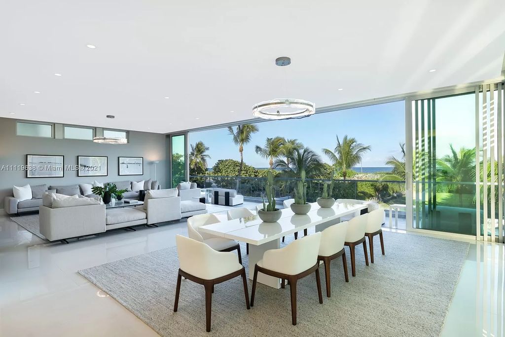 The Miami Beach Home is a stunning new modern construction estate in the esteemed gated Oceanfront community, Altos Del Mar. now available for sale. This house located at 7833 Atlantic Way, Miami Beach, Florida