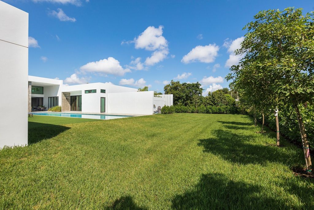 The Home in Miami is a brand new modern masterpiece built with the finest finishes and multiple water features now available for sale. This home located at 6645 SW 116th St, Miami, Florida