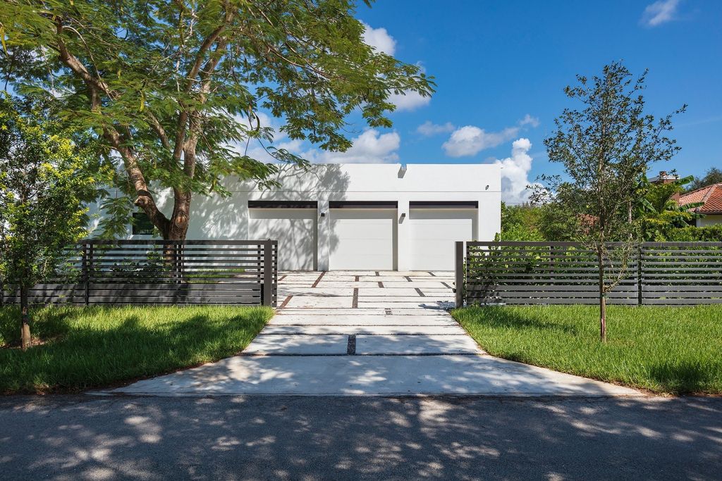 The Home in Miami is a brand new modern masterpiece built with the finest finishes and multiple water features now available for sale. This home located at 6645 SW 116th St, Miami, Florida