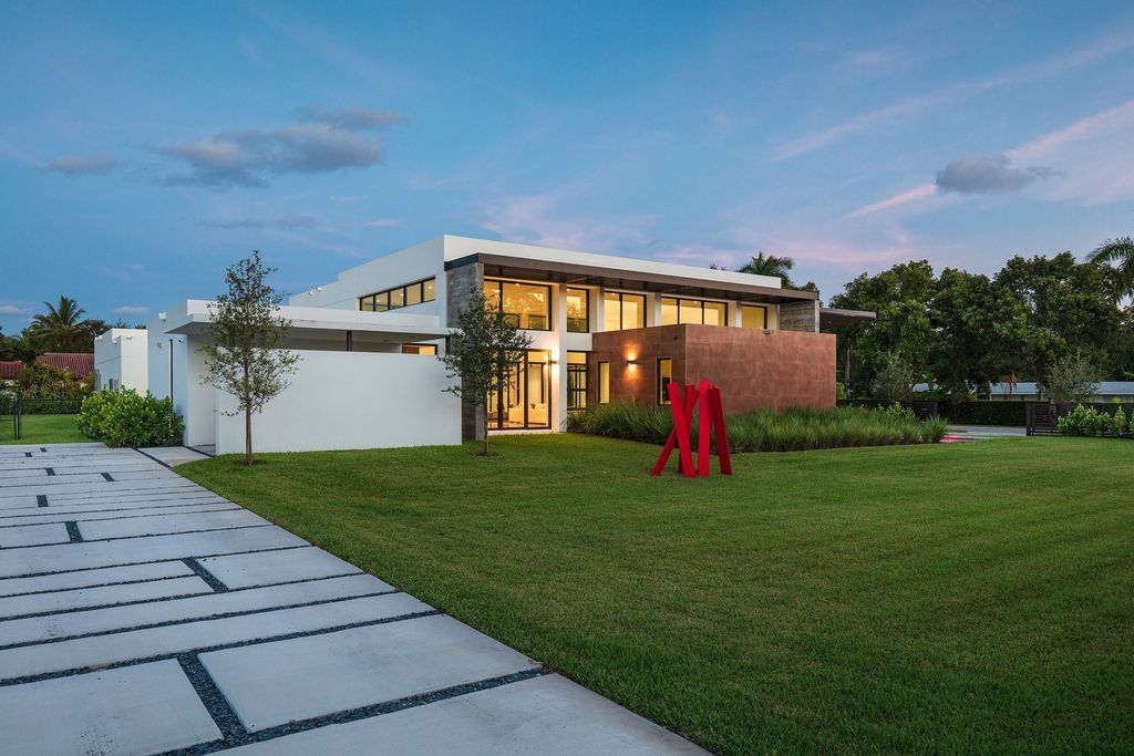 The Home in Miami is a brand new modern masterpiece built with the finest finishes and multiple water features now available for sale. This home located at 6645 SW 116th St, Miami, Florida