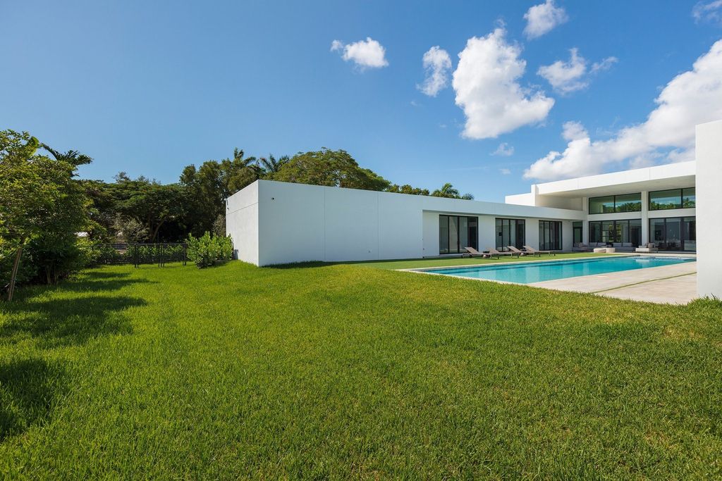 The Home in Miami is a brand new modern masterpiece built with the finest finishes and multiple water features now available for sale. This home located at 6645 SW 116th St, Miami, Florida