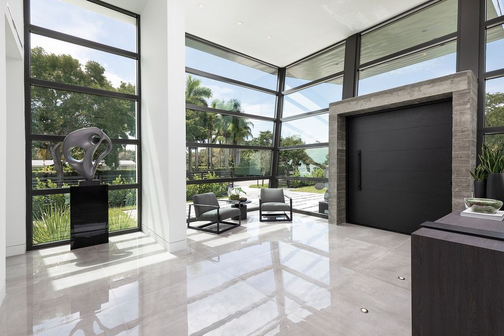 The Home in Miami is a brand new modern masterpiece built with the finest finishes and multiple water features now available for sale. This home located at 6645 SW 116th St, Miami, Florida