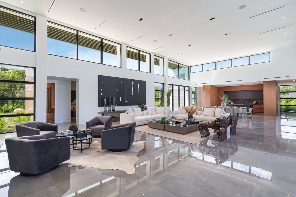 The Home in Miami is a brand new modern masterpiece built with the finest finishes and multiple water features now available for sale. This home located at 6645 SW 116th St, Miami, Florida