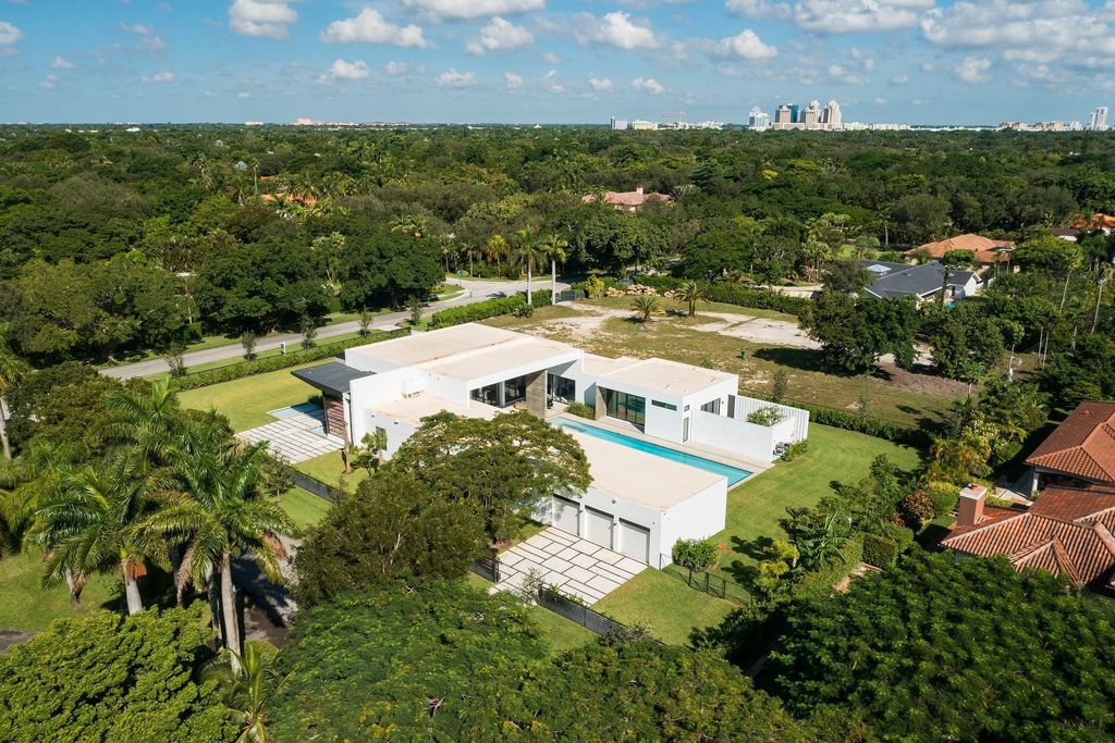 The Home in Miami is a brand new modern masterpiece built with the finest finishes and multiple water features now available for sale. This home located at 6645 SW 116th St, Miami, Florida