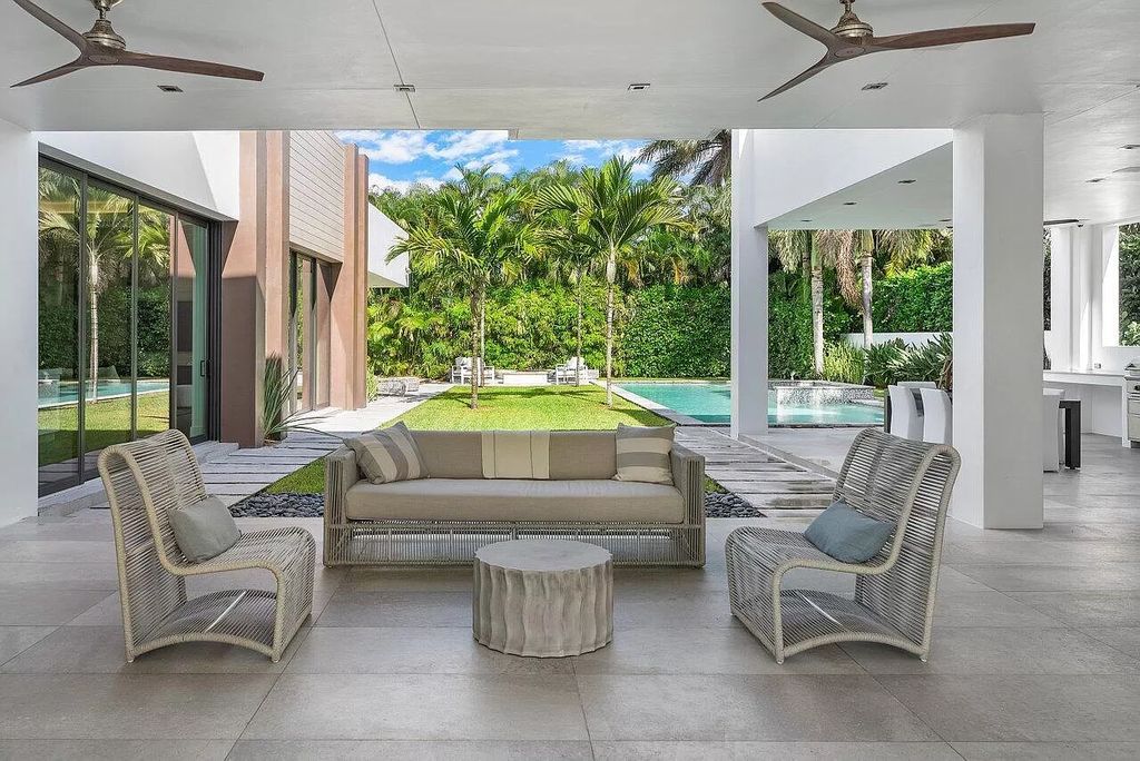 The Home in Boca Raton is a stunning contemporary custom home by award winning Affiniti Architects & CDC Builders now available for sale. This house located at 383 Thatch Palm Dr, Boca Raton, Florida