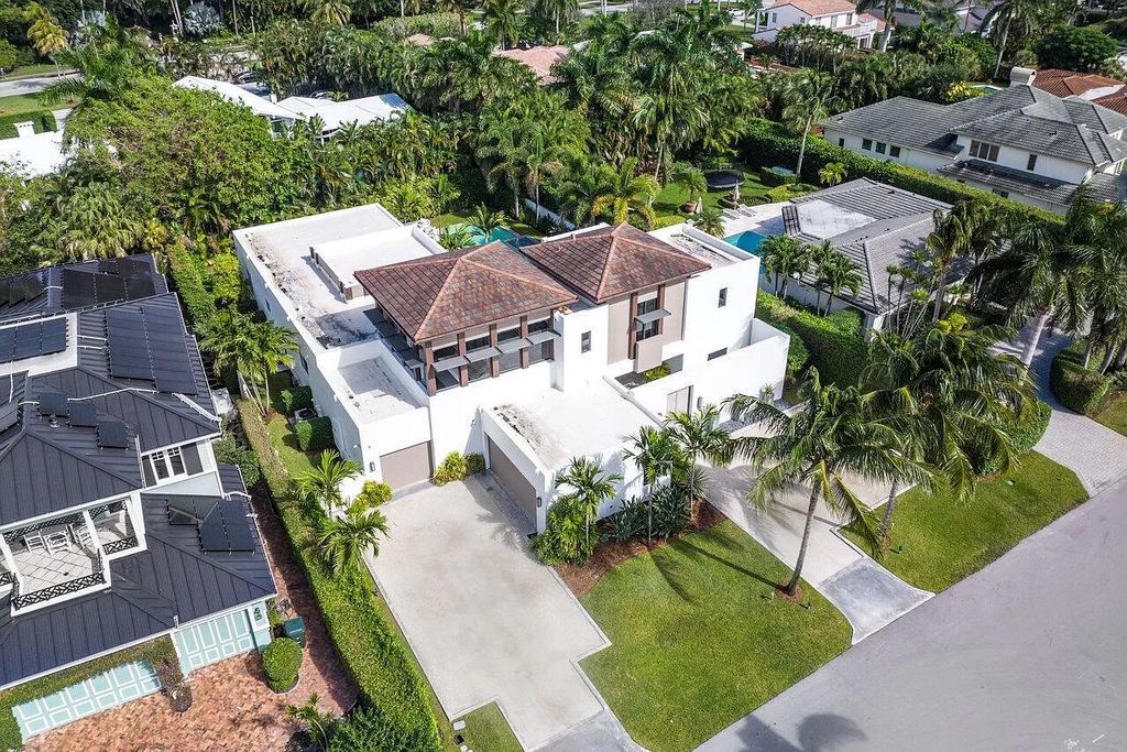 The Home in Boca Raton is a stunning contemporary custom home by award winning Affiniti Architects & CDC Builders now available for sale. This house located at 383 Thatch Palm Dr, Boca Raton, Florida